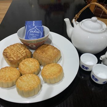King's Bakery - a plate of moon cakes and a teapot - Bakeries Near Me - Portland, Oregon King's Bakery - a plate of moon cakes and a teapot - Bakeries Near Me - Portland, Oregon