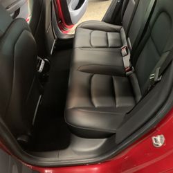 Tesla modal3 Ceramic coating done by Lotus Hand Car Wash and Detail , interior detail