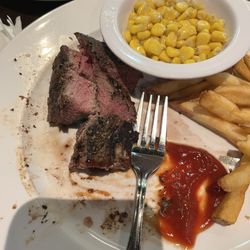 Chuck's Roadhouse Bar And Grill - Can see the steak is raw in the middle after trying to cook it twice.