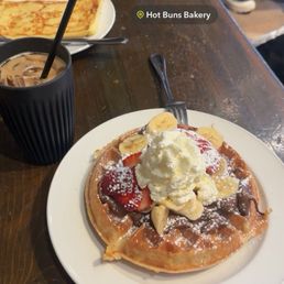 Waffle with strawberries bananas and Nutella