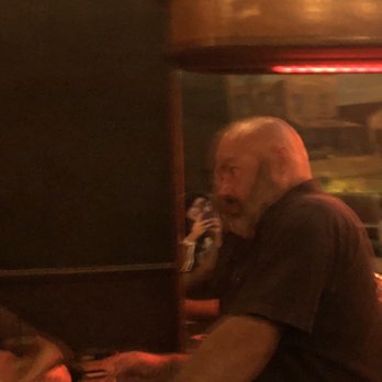 The Saloon - a man sitting at a bar - Dive Bars Near Me - Encinitas, California