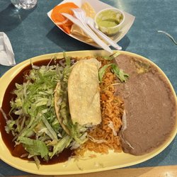 Los Victors - No. 5 taco & cheese enchilada plate with rice and beans. I requested no cheese on top for a semi vegan lunch.