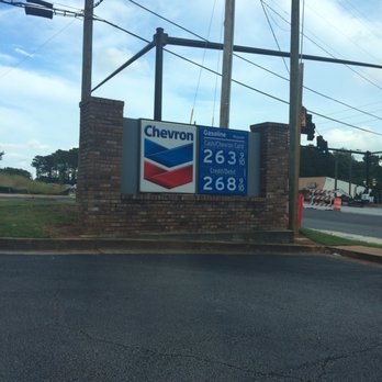 Chevron - a gas station sign on a street corner - Gas Stations Near Me - McDonough, Georgia Chevron - a gas station sign on a street corner - Gas Stations Near Me - McDonough, Georgia
