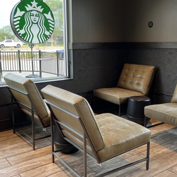Starbucks - lounge chairs and a coffee table in a coffee shop - Coffee & Tea Near Me - Highland Park, Illinois Starbucks - lounge chairs and a coffee table in a coffee shop - Coffee & Tea Near Me - Highland Park, Illinois