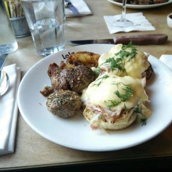 Lola - The ever popular eggs Benedict. Delicious potatoes! - Greek Near Me - Seattle, Washington Lola - The ever popular eggs Benedict. Delicious potatoes! - Greek Near Me - Seattle, Washington