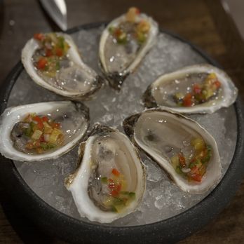 Prescott's Provisions - Raw oysters  Seasoned with jingle bell pepper, mignonette - New American Near Me - Tonawanda, New York