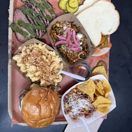 Brisket, smokes chicken sandwich, Mac and cheese, Texas caviar and Cole slaw Brisket, smokes chicken sandwich, Mac and cheese, Texas caviar and Cole slaw