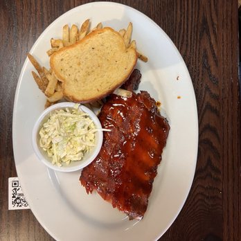 Smokey Bones - Half a rack of ribs, french fries coleslaw, and Garlic Bread. - Barbeque Near Me - Utica, Michigan Smokey Bones - Half a rack of ribs, french fries coleslaw, and Garlic Bread. - Barbeque Near Me - Utica, Michigan