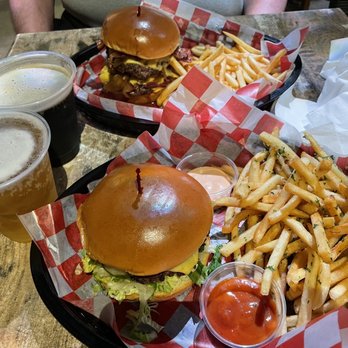 Banzai Burger - Waimea Burger with regular fries up top and Pipeline burger with sauces on the side with garlic fries! - Burgers Near Me - Honolulu, Hawaii