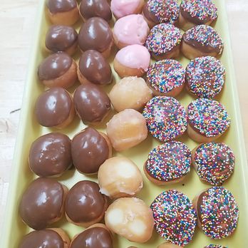 Donuts Plus - a row of different flavored donuts - Donuts Near Me - Fort Worth, Texas Donuts Plus - a row of different flavored donuts - Donuts Near Me - Fort Worth, Texas