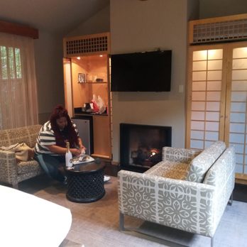 Gaige House - Living room space with bar, mini fridge, fireplace and tv - Hotels Near Me - Glen Ellen, California