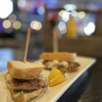 The Standard Station - two sandwiches on a plate - Sports Bars Near Me - El Segundo, California The Standard Station - two sandwiches on a plate - Sports Bars Near Me - El Segundo, California