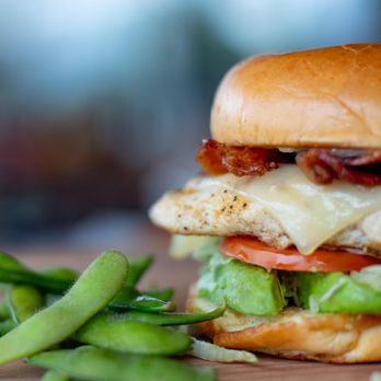 Jaggers - a chicken sandwich with lettuce, tomato, and cheese - Burgers Near Me - Indianapolis, Indiana Jaggers - a chicken sandwich with lettuce, tomato, and cheese - Burgers Near Me - Indianapolis, Indiana
