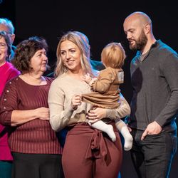 Lifepoint Church - Delaware - Family on stage during child dedications at Lifepoint - Delaware Campus.