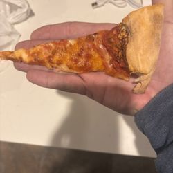Fellinis Pizzeria - I like Fellinis this is not a slice it's almost criminal. What is this??
