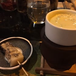 Check-In Taipei - Mochi yaki cocktail - rum, Hakka lei- cha, oolong tea, frangelico hazelnut with honey glazed mochi...yum!!!