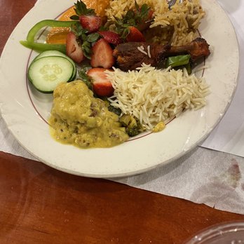 Thali of India - Assorted plate (Kadi Pakora, Tandoori Chicken, strawberries, cucumbers, rice) - Indian Near Me - Rochester, New York Thali of India - Assorted plate (Kadi Pakora, Tandoori Chicken, strawberries, cucumbers, rice) - Indian Near Me - Rochester, New York