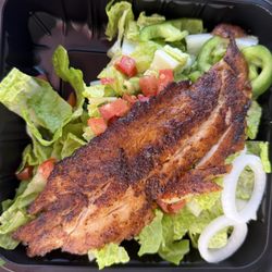 Bites On The Bay - Blackened grouper over a house salad.
