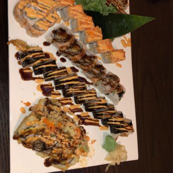 Shinko Grill - Volcano roll, spider roll, shrimp tempura roll, dynamite roll, Carolina roll, and tiger roll (bottom to top) - Sushi Bars Near Me - High Point, North Carolina Shinko Grill - Volcano roll, spider roll, shrimp tempura roll, dynamite roll, Carolina roll, and tiger roll (bottom to top) - Sushi Bars Near Me - High Point, North Carolina