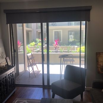 Blue Ribbon Drapery - Living room slider roller shade open. - Shades & Blinds Near Me - Paramount, California