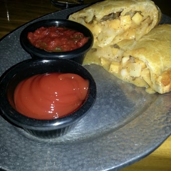 Cornish Pasty - Cheese and Onion Pasty with ketchup and marinara on the side. - British Near Me - Las Vegas, Nevada Cornish Pasty - Cheese and Onion Pasty with ketchup and marinara on the side. - British Near Me - Las Vegas, Nevada