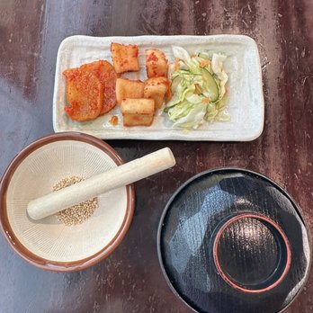 Koromo - Pickled veggie sides, miso soup and sesame seeds to grind. - Japanese Near Me - Aiea, Hawaii Koromo - Pickled veggie sides, miso soup and sesame seeds to grind. - Japanese Near Me - Aiea, Hawaii