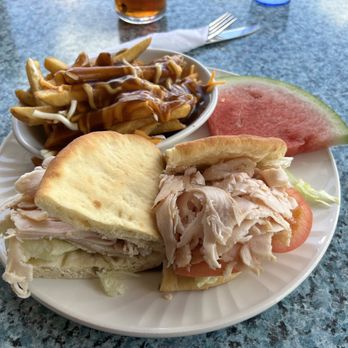 The Secret Garden Restaurant - Smoked turkey sandwich (C$18.99) w/ poutine (C$3.99 upcharge) poutine was awesome - Breakfast & Brunch Near Me - Niagara Falls, Ontario The Secret Garden Restaurant - Smoked turkey sandwich (C$18.99) w/ poutine (C$3.99 upcharge) poutine was awesome - Breakfast & Brunch Near Me - Niagara Falls, Ontario