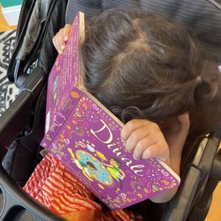 Rohi's Readery - My daughter reading the Diwali book we got her from here
