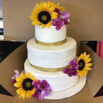 Barbs B&B - a three tiered cake with sunflowers on top - Custom Cakes Near Me - Beaver Dam, Kentucky