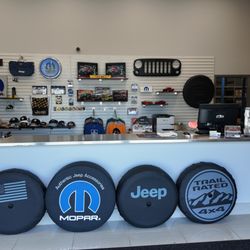 Quirk Chrysler Jeep - Quirk Chrysler Jeep's service center with official merchandise and parts.