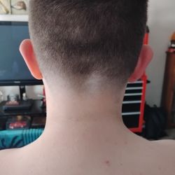 Jerry's Barber Shop - Worse haircut he's ever had. You can see his neck is uneven and the fade on the left is more than the right