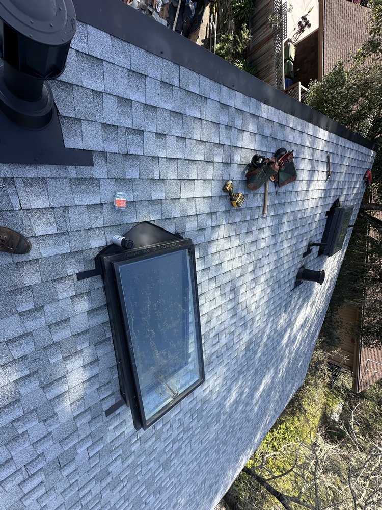 Slide of Vigil Roofing