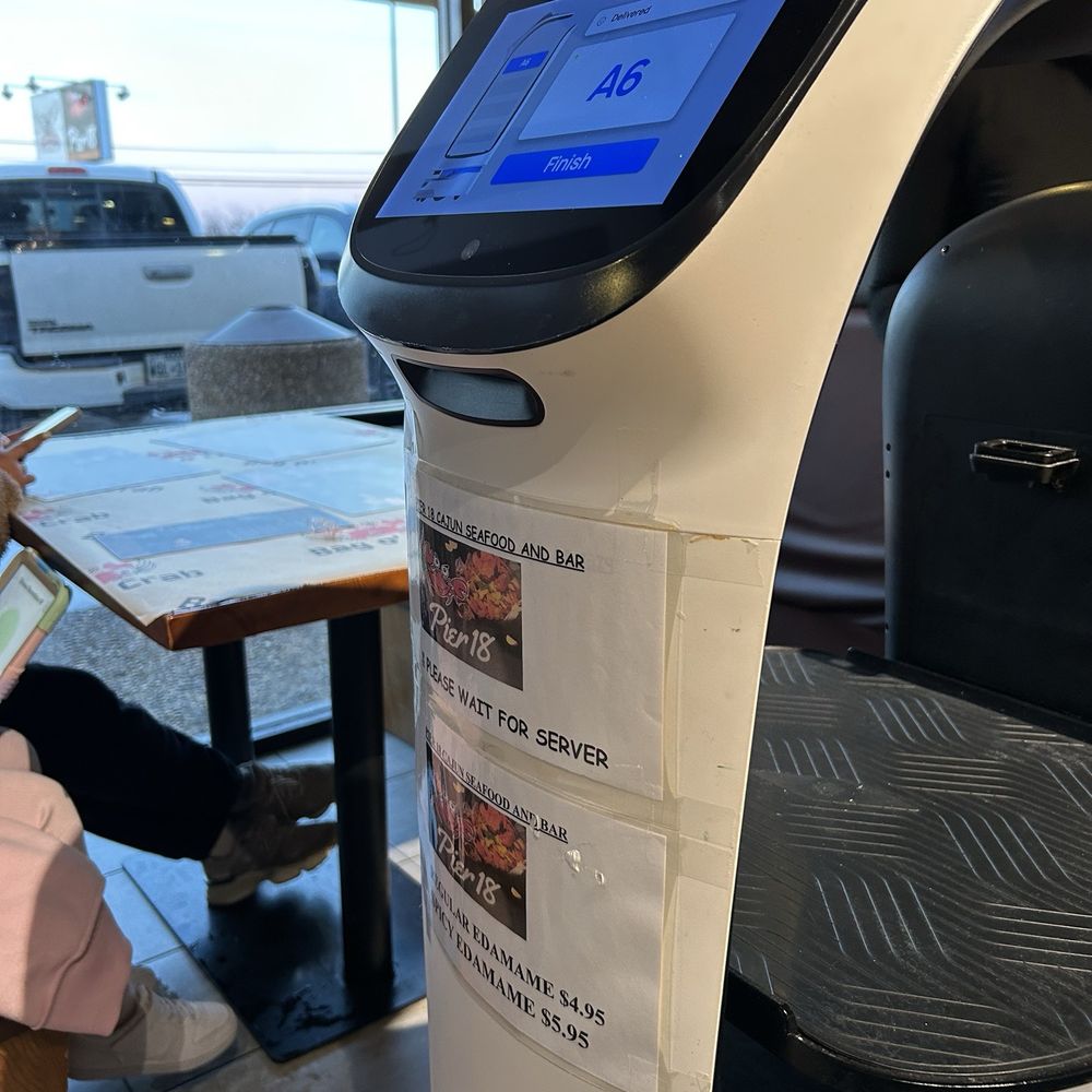 Pier 18 - Robot server brings your order - Seafood Near Me - Saginaw, Texas Pier 18 - Robot server brings your order - Seafood Near Me - Saginaw, Texas