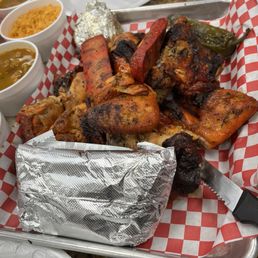 Whole chicken, Mexican sausage, onion (in foil), tortillas, rice, beans, avacado and grilled jalapeno.