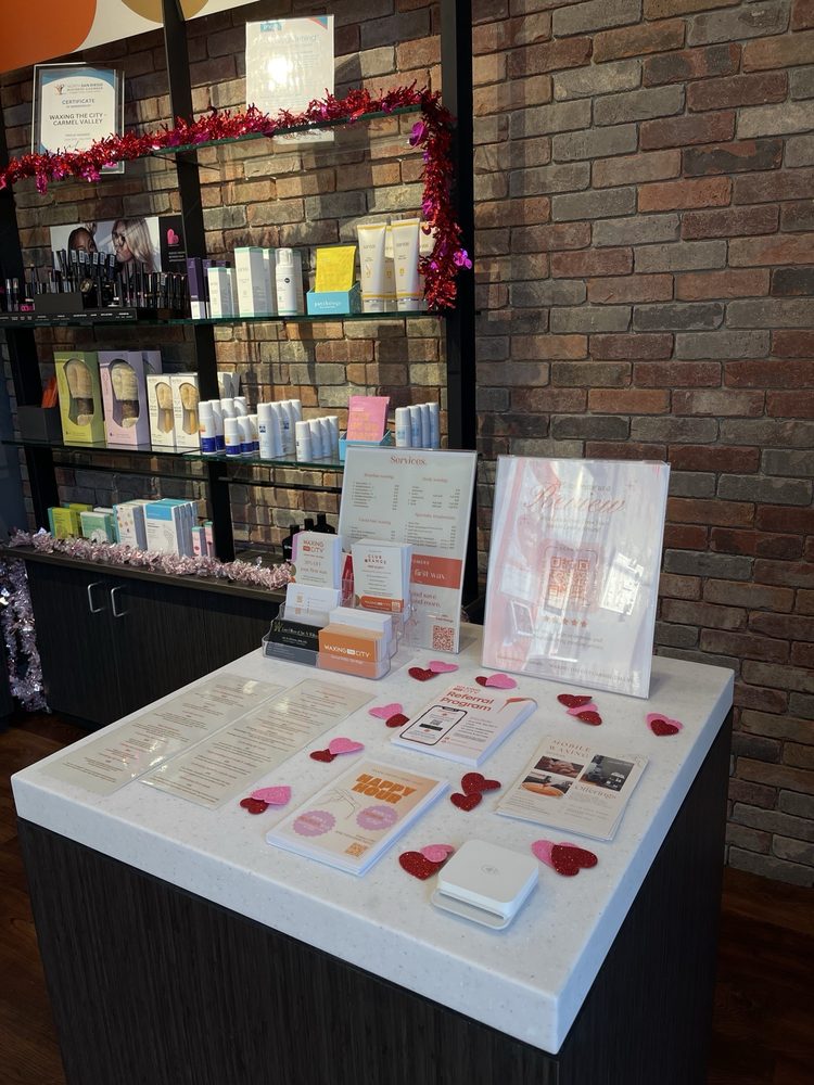 Waxing the City Logo