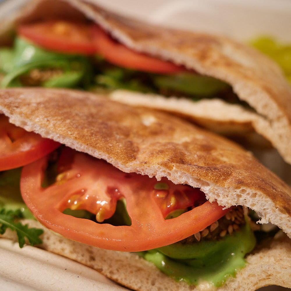 Middle Eats - "Double pita falafel"  There are three falafel hiding in each pita - Middle Eastern Near Me - Honolulu, Hawaii