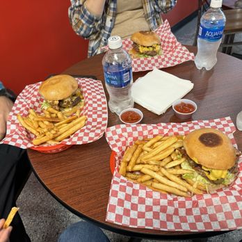 Mean Burger - Back is the bacon burger w.cheese left is the egg burger and bottom is the Baja burger.   SO GOOD!!!! - Burgers Near Me - Humble, Texas
