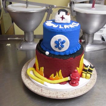 Tiffiny's Tipton Bakery - Buttercream iced graduation cake with fondant medical and fireman accents. - Bakeries Near Me - Tipton, Iowa Tiffiny's Tipton Bakery - Buttercream iced graduation cake with fondant medical and fireman accents. - Bakeries Near Me - Tipton, Iowa