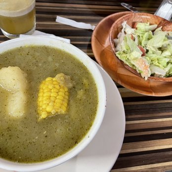 La Pollera Colorada - Ajiaco soup with salad. A homemade dressing would've been nice, vs some bottled condiments or oil and vinegar. - Colombian Near Me - Clearwater, Florida La Pollera Colorada - Ajiaco soup with salad. A homemade dressing would've been nice, vs some bottled condiments or oil and vinegar. - Colombian Near Me - Clearwater, Florida