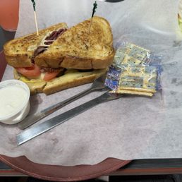 Pastrami on Rye (toasted) with pepper jack, tomato and pickles. This was a build your own sandwich.