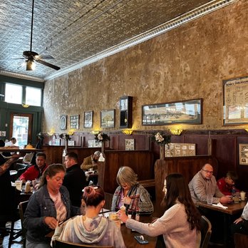 Schilo's - people sitting at tables in a restaurant - Delis Near Me - San Antonio, Texas