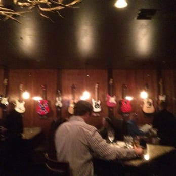 Firefly - Guitars on the wall in the sushi bar. - Steakhouses Near Me - Panama City Beach, Florida Firefly - Guitars on the wall in the sushi bar. - Steakhouses Near Me - Panama City Beach, Florida
