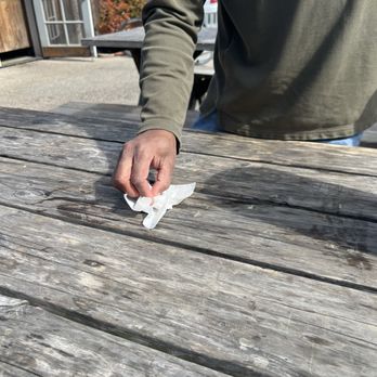 The Barn - Cleaning our own table after asking someone to clean. They never came. Thank goodness for baby wipes. - Burgers Near Me - Half Moon Bay, California The Barn - Cleaning our own table after asking someone to clean. They never came. Thank goodness for baby wipes. - Burgers Near Me - Half Moon Bay, California
