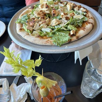 Tides Restaurant & Pub - Chicken Caesar Salad Pizza. Bloody Mary. - Seafood Near Me - Nahant, Massachusetts Tides Restaurant & Pub - Chicken Caesar Salad Pizza. Bloody Mary. - Seafood Near Me - Nahant, Massachusetts