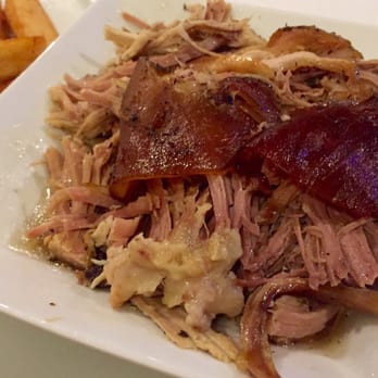 Casa Del Campo - Pile of pernil- perhaps a pound plus - Dominican Near Me - North Babylon, New York Casa Del Campo - Pile of pernil- perhaps a pound plus - Dominican Near Me - North Babylon, New York