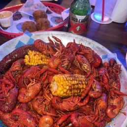 3 lbs of crawfish with smoked garlic sausage and corn