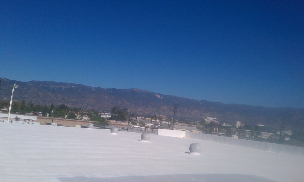 Slide of Foam Bond-A Quality Roofing