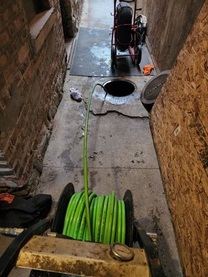 Hydro jetting sewer line. - Customer had grease build up in his catch basin drain line. Hydro jetting cleared the line and had it working correctly.