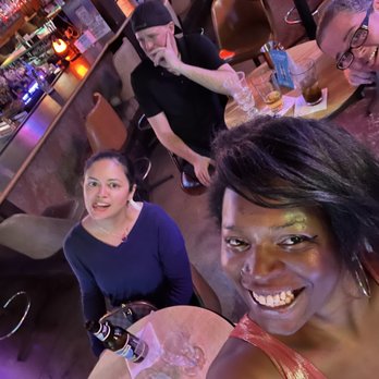 The Canary Roost - a group of people at a bar - Karaoke Near Me - Austin, Texas The Canary Roost - a group of people at a bar - Karaoke Near Me - Austin, Texas