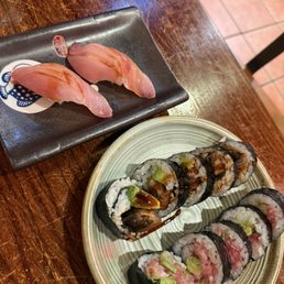 Hamachi nigiri, unagi avo roll, negi toro roll Hamachi nigiri, unagi avo roll, negi toro roll